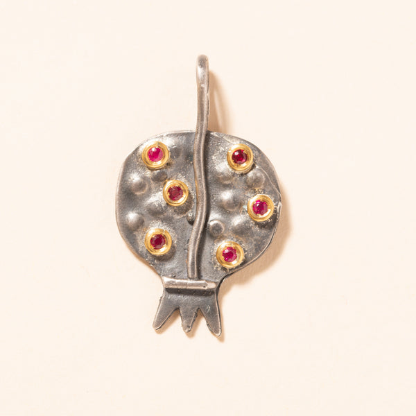 silver pomegranate pendant with rubies set in gold