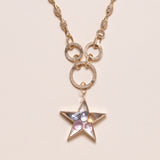 multi colored sapphires in star pendant
