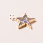 multi colored sapphires in star pendant