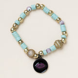 Vinyl, Brass, CZ Diamonds, Enamel & Ruby