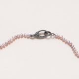 Freshwater seed pearls with Oxidized silver and pave diamond clasp