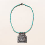 Kingman Turquoise Necklace with Silver Deity Pendant