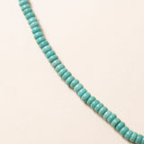 Kingman Turquoise Necklace with Silver Deity Pendant