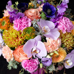 Vibrant orchid and rose bouquet with lush chrysanthemums and carnations showcasing Bloom by Anuschka s signature flower crafting artistry in Denver