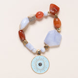 Carnelian, Chalcedony, Dinosaur Bone, Brass, Blue Enamel & Diamonds