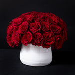 Corazon is an opulent arrangement featuring lush, velvety red roses in a pristine white vase, creating a striking and romantic statement. Perfect for anniversaries, Valentine’s Day, romantic gestures, and elegant celebrations, this luxurious design is available for flower delivery in Denver, including Cherry Creek, Country Club, Hilltop, and Belcaro. Please note: Fresh flower delivery is limited to the local Denver area.