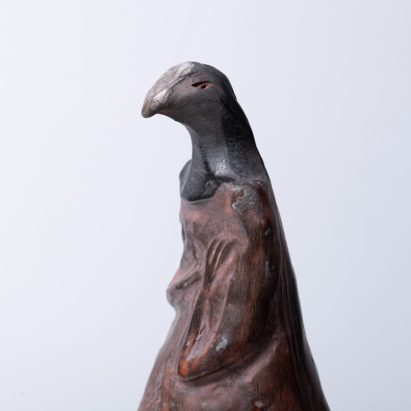 Handcrafted Bird Sculpture on Wooden Stand