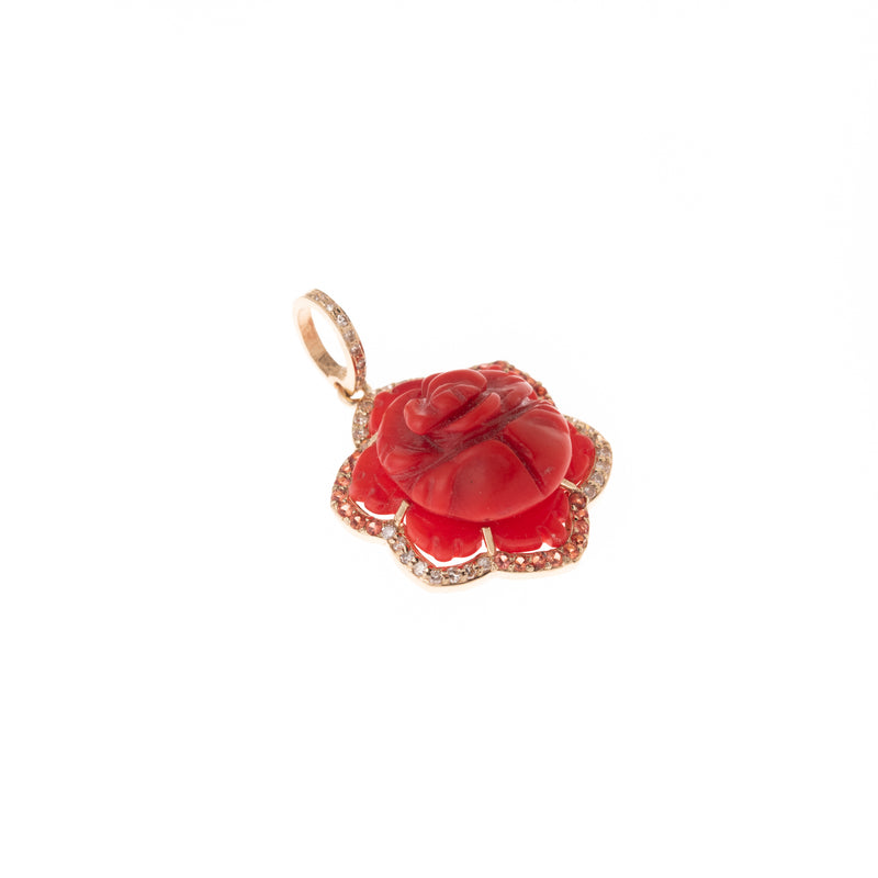 carved rose in gold with diamond pendant 