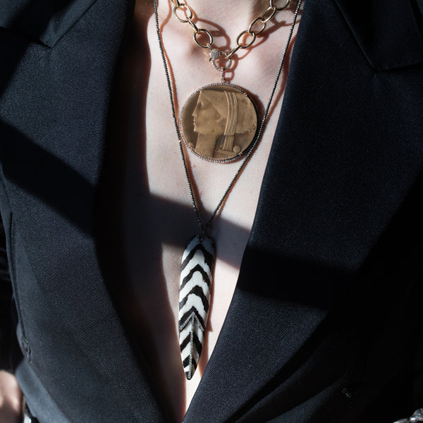 African bone pendant styled on model