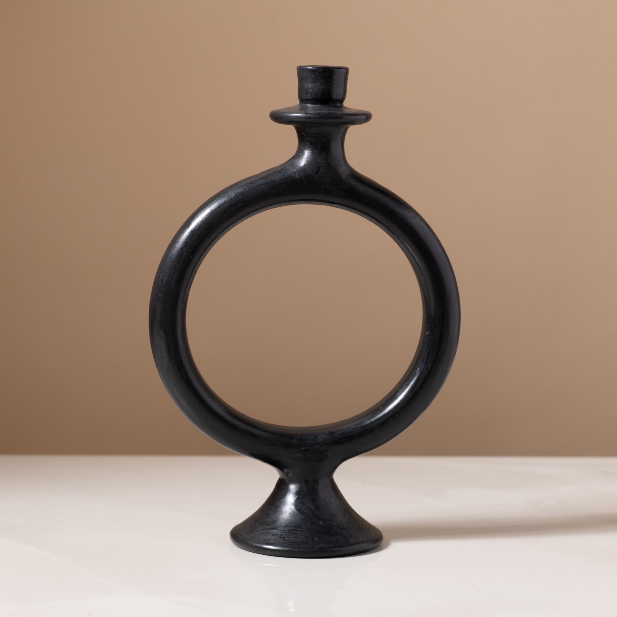 O Candleholder