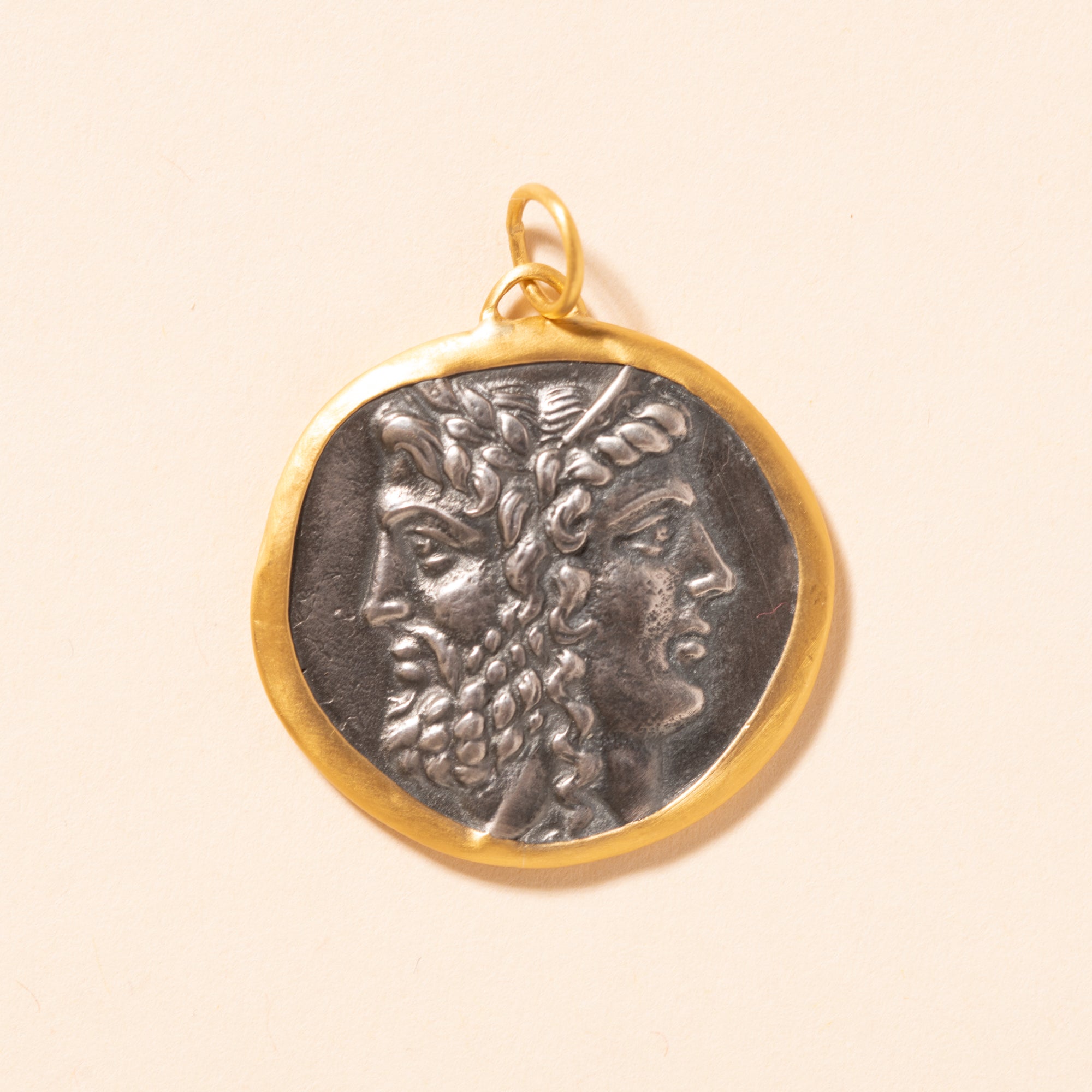 silver janus and janus pendant with gold