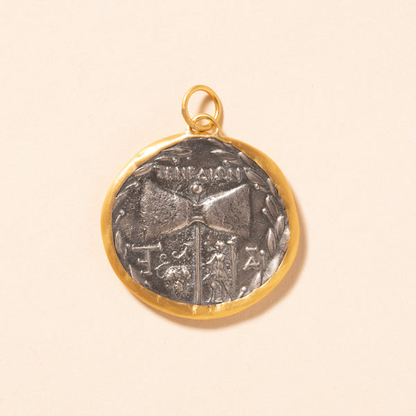 silver janus and janus pendant with gold