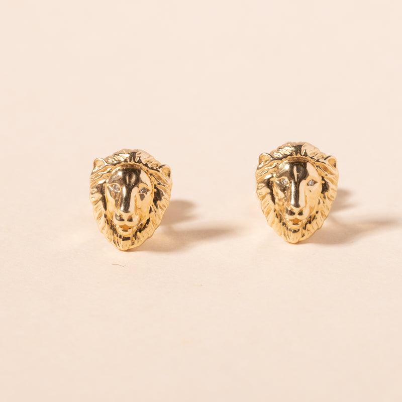 gold lion head with diamond eyes stud earrings