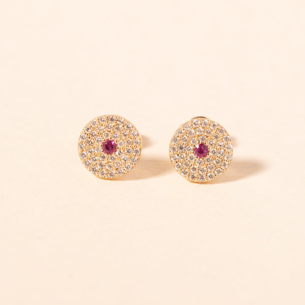 gold and diamond disc studs with pink sapphire center 