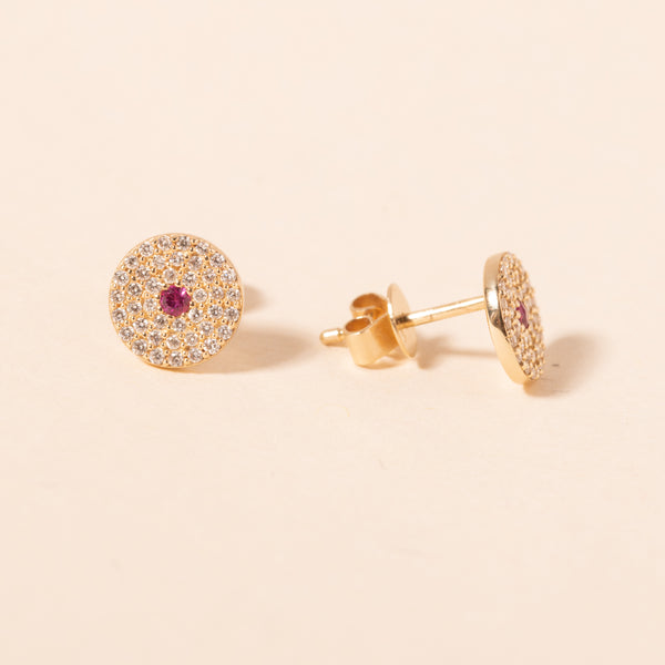 gold and diamond disc studs with pink sapphire center 