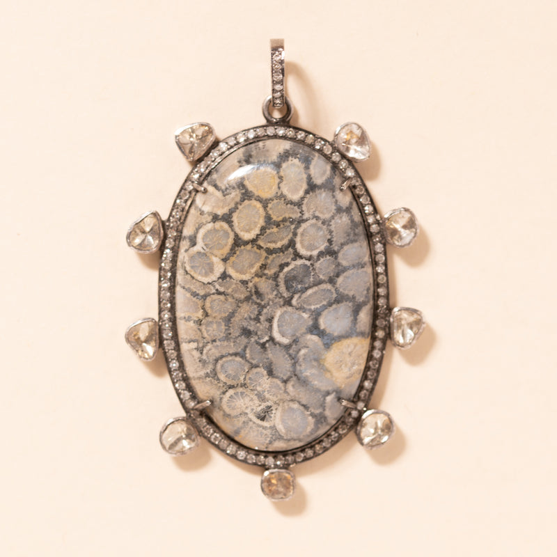 pave and polki diamond pendant with coral center 