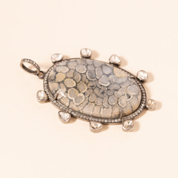 pave and polki diamond pendant with coral center 