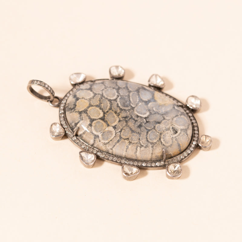pave and polki diamond pendant with coral center 