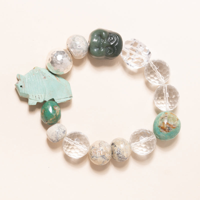 Stegosaurus fossil, Crystal, Vintage Turquoise, and Silver Beads with Jade Buddha and Kingman Turquoise Bison Charms Bloom Bracelet