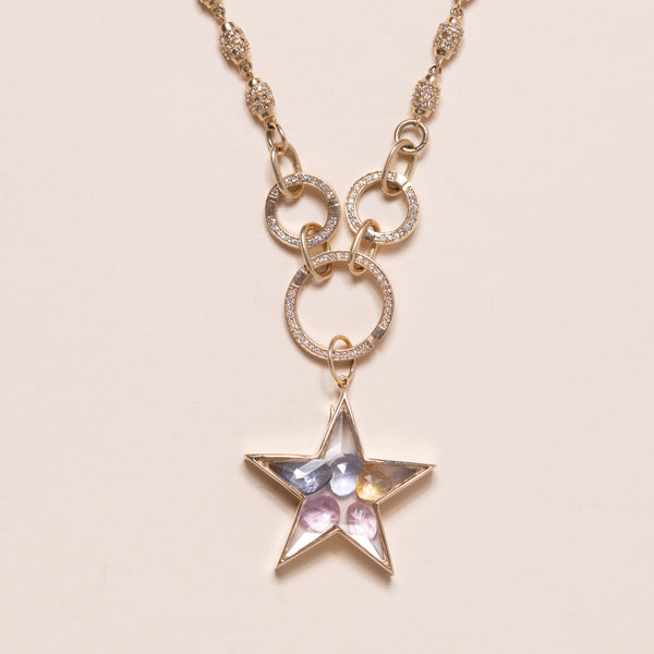 multi colored sapphires in star pendant 