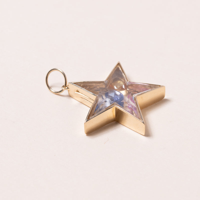 multi colored sapphires in star pendant 