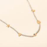16in Silver and diamond necklace with gold hasma, star, heart, evil eye and smiley face charm