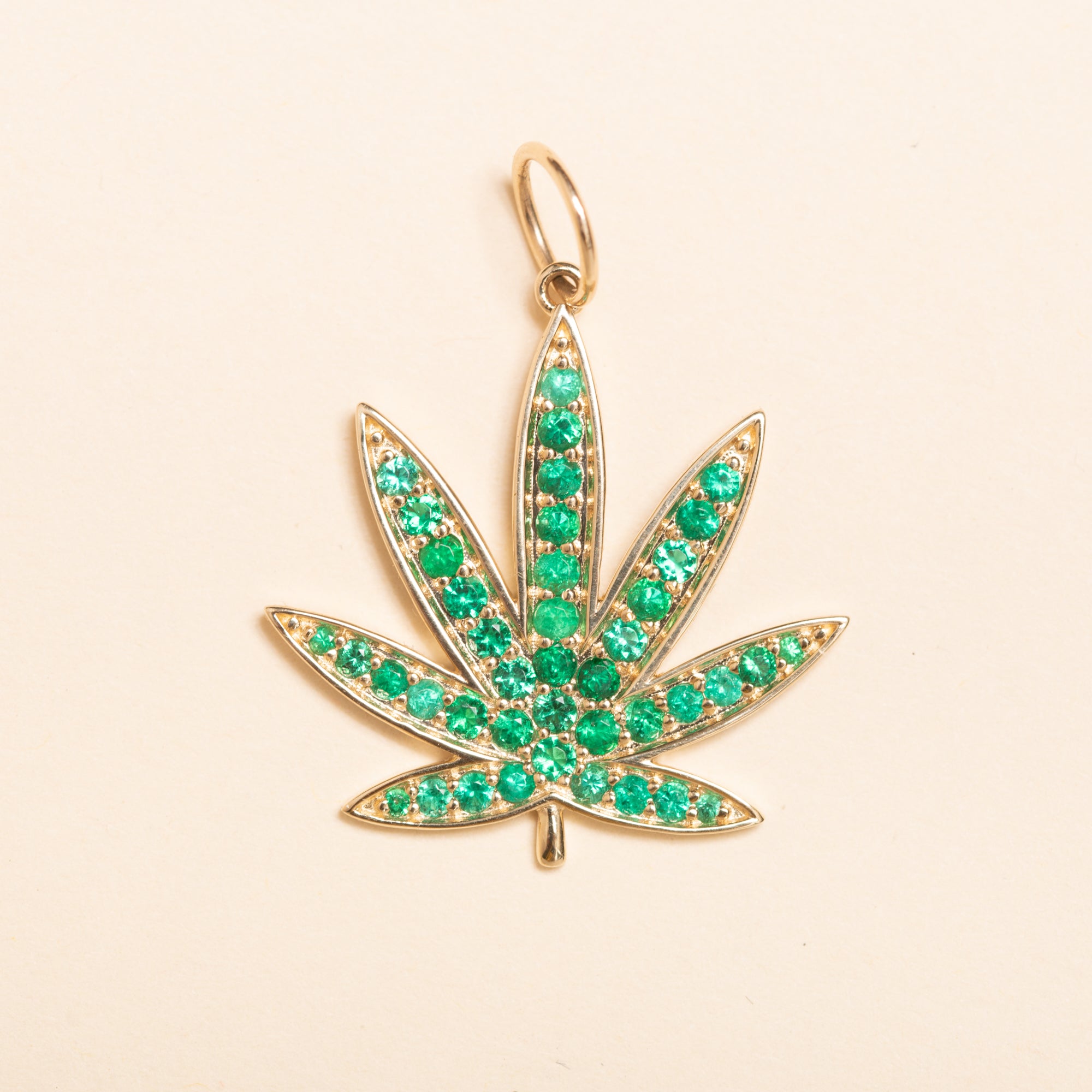 gold and emerald Colorado flower pendant 