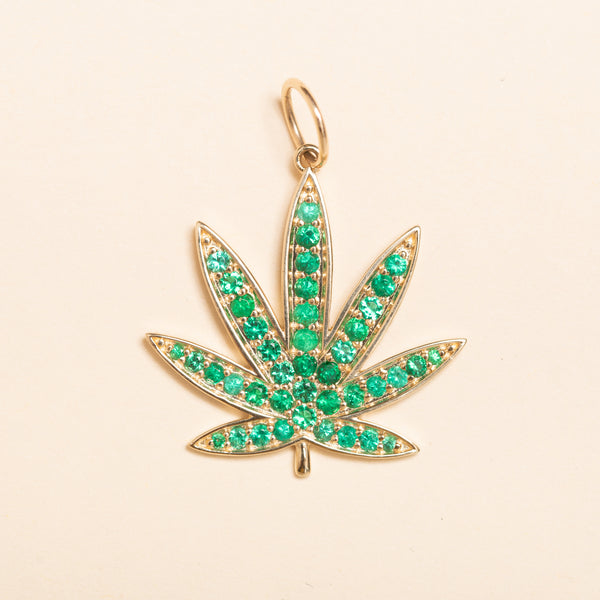 gold and emerald Colorado flower pendant 