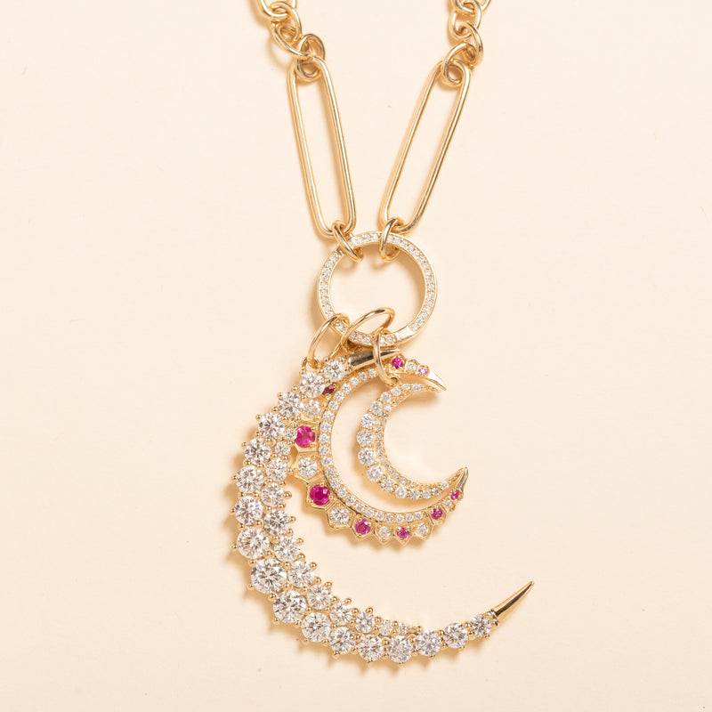 hollow elongated chain link necklace with diamond connector with pendants
