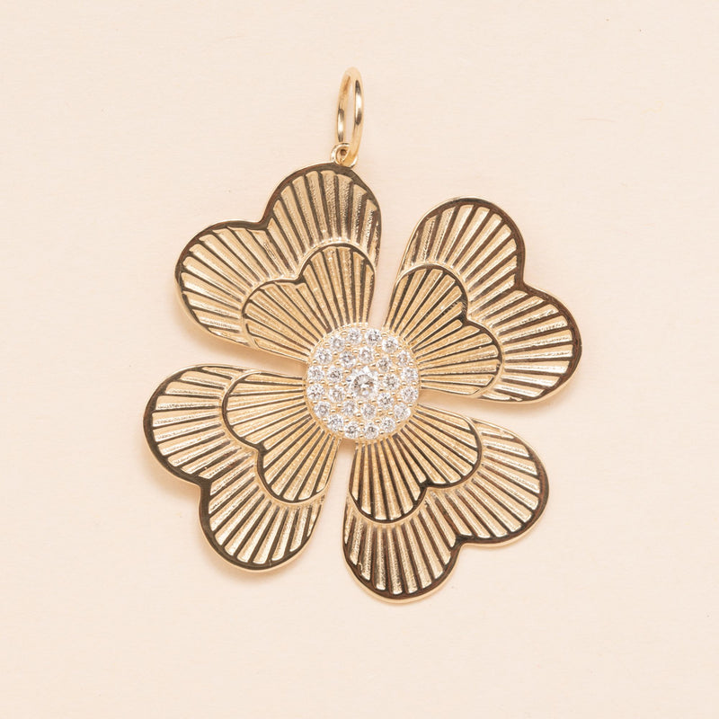 large gold and diamond clover pendant 