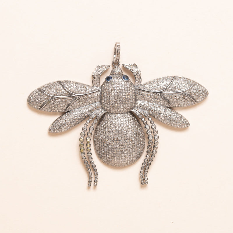 silver beetle pendant with diamonds and sapphires
